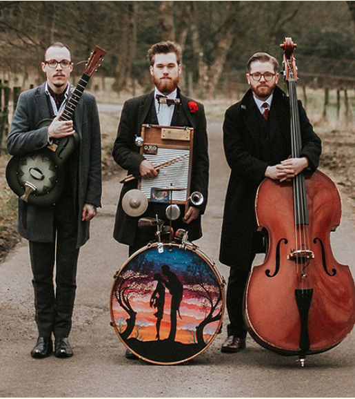 Leeds City Stompers standing with instruments